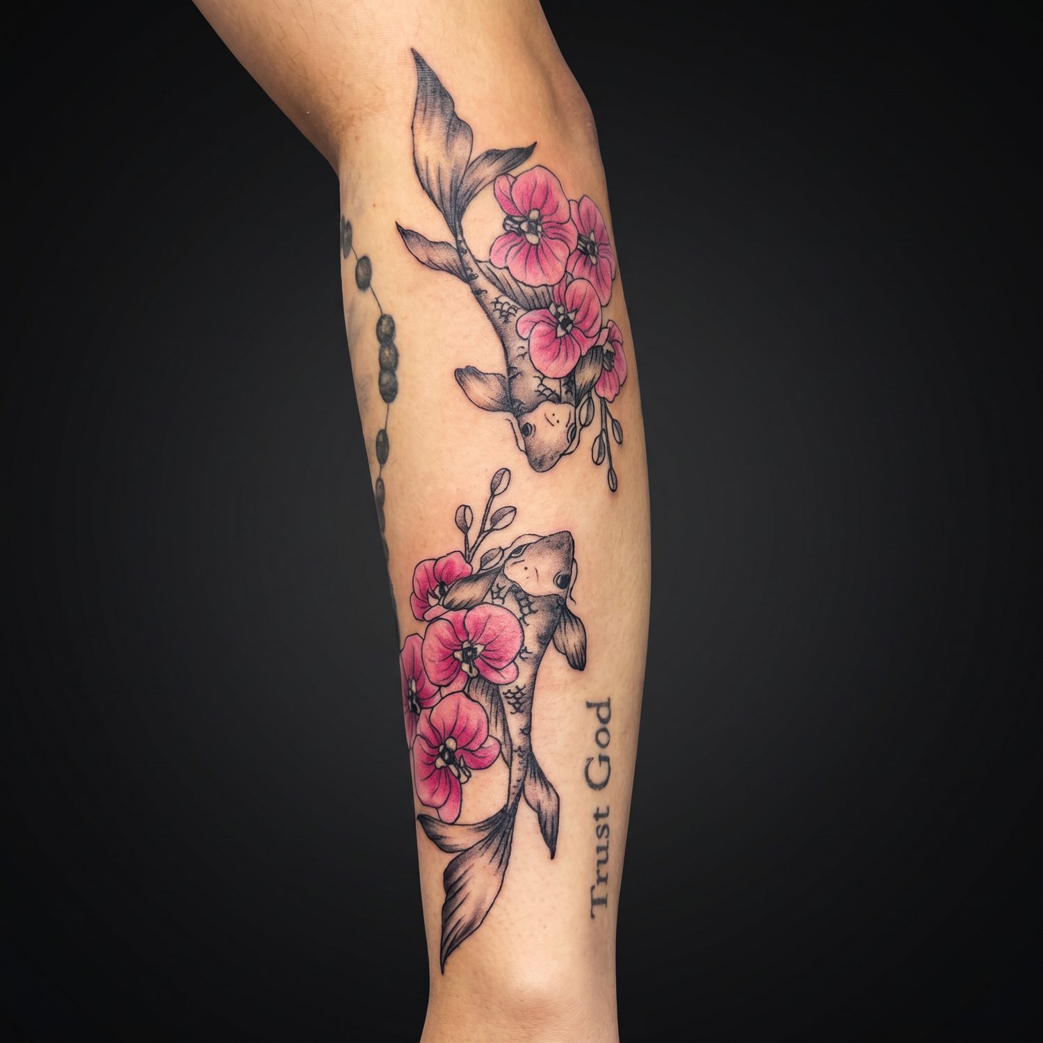 Fine-line cherry blossom tattoo